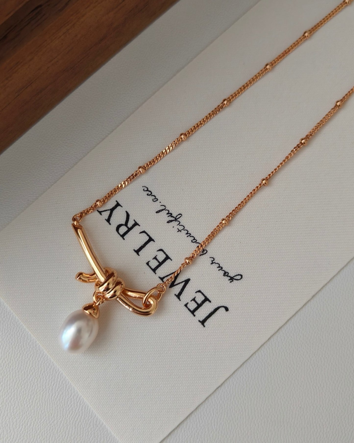 Pearl Drop Necklace with Gold Knot Necklace